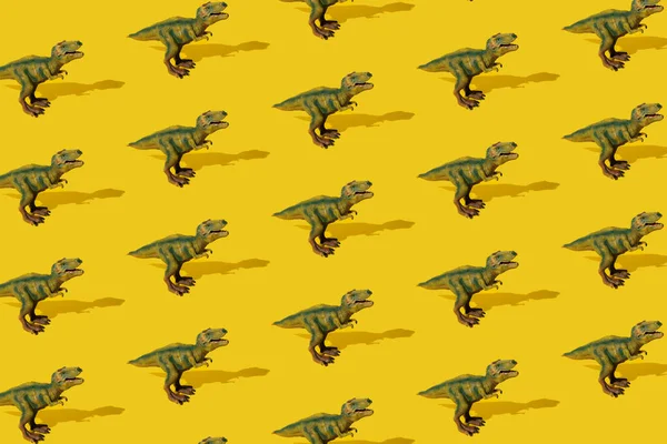 Dinosaurs Tyrannosaurus Rex Yellow Background Pattern Rex Toy — Stockfoto
