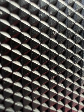 Plastik kaplı siyah levha arka plan örtüsü köşedeki zıt ışık ve karanlık deseni tekrarlayan desenlerin grafik tasarımını yükseltti.