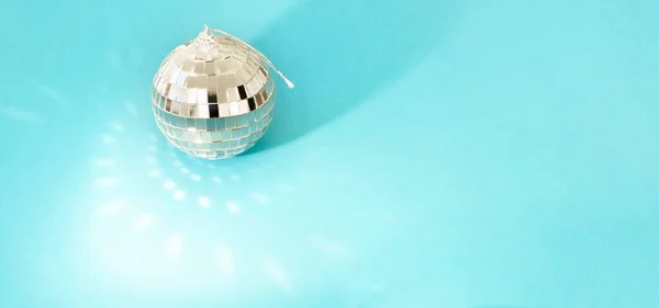 Happy Holidays Shimmering Disco Ball Blue Background Copy Space Glare — Stok fotoğraf