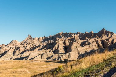 ABD 'nin Badlands Ulusal Parkı' ndaki geniş manzara ve kumtaşı tepeleri