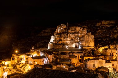 Famous cave church Saint Mary of Idris in Matera at night, Italy
