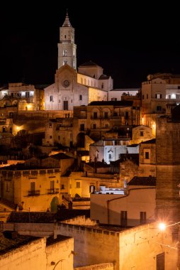 Scenic illuminated cathedral of Matera at night, Italy