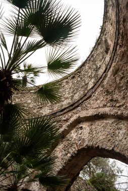 RAVELLO, ITALY - APRIL 31 2022 - Old ruins in the park of famous Villa Rufolo at the Amalfi Coast