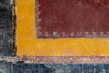 STABIA, ITALY - MAY 03, 2022 - Vibrant frescos of the archaeological Roman sight Villa S. Marco in Stabia, Southern Italy