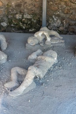 POMPEII, ITALY - MAY 04, 2022 - Pompeiian inhabitants petrified in their last situation of life, Southern Italy