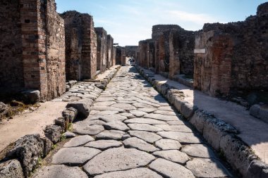 A beautiful typical cobbled street in the ancient city of Pompeii, Southern Italy