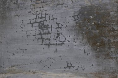 Çatlaklar ve çizikler olan gri beton duvar dokusunu kapat. Doğal Arkaplan.