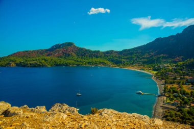 KUMLUBUK, MARIS, MUGLA, TURKEY: Amos antik kentinden Marmaris Kumlubuk plajının manzarası.