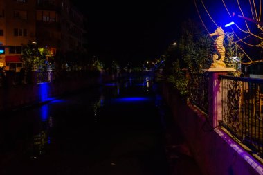 MARMARIS, MUGLA, TURKEY: Sculpture of a Seahorse on the street by the canal in Marmaris at night.