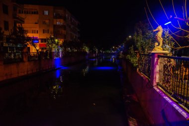 MARMARIS, MUGLA, TURKEY: Sculpture of a Seahorse on the street by the canal in Marmaris at night.