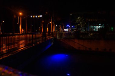 MARMARIS, MUGLA, TURKEY: Beautiful canal in the city center with blue illumination at night in Marmaris.