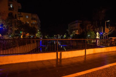 MARMARIS, MUGLA, TURKEY: Sculpture of a Seahorse on the street by the canal in Marmaris at night.