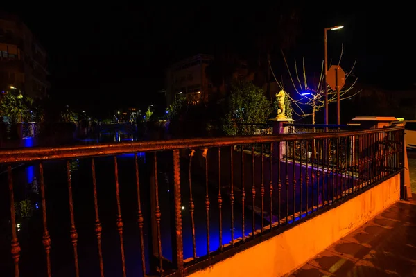 MARMARIS, MUGLA, TURKEY: Sculpture of a Seahorse on the street by the canal in Marmaris at night.