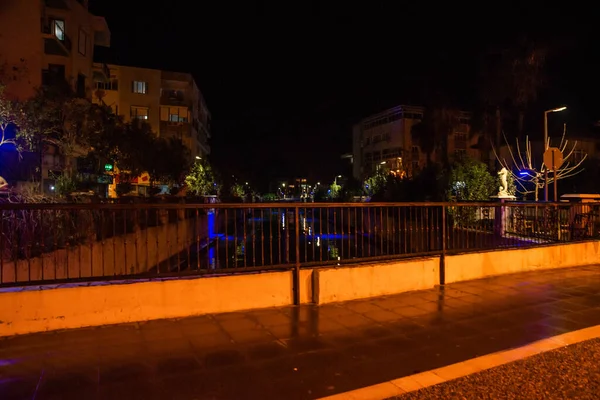 MARMARIS, MUGLA, TURKEY: Sculpture of a Seahorse on the street by the canal in Marmaris at night.