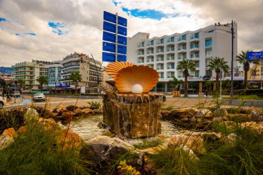 MARMARIS, MUGLA, TURKEY: A monument of Shells with a Pearl from which water pours on the stones at the Courthouse in Marmaris.