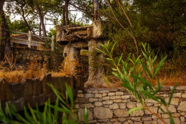 CAMYUVA, KEMER, TURKEY: The destroyed buildings of the old hotel Holiday Area Eco Dream Club Sea Resort in the forest.
