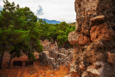 PHASELIS, TURKEY: View of the ruins of the ancient city of Phaselis on a cloudy day in Turkey, Antalya province, near Kemer.