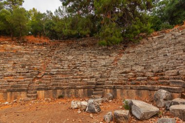 PHASELIS, KEMER, TURKEY: Ruins of the amphitheatre of the ancient city of Phaselis in Turkey, village Tekirova, Antalya province, near Kemer.