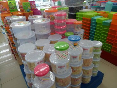 lots of white jars neatly arranged photo