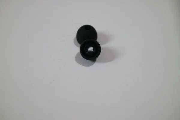 Some Small Black Earphone Rubber Photo — Stock Photo, Image
