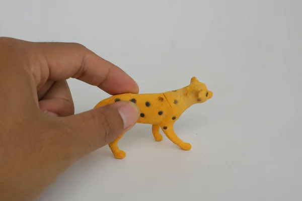 Желтая Леопардовая Игрушка Пластиковой Фотографии — стоковое фото