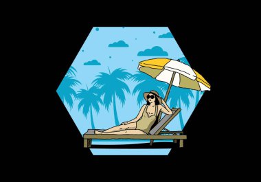 Şemsiye tasarımı altındaki plaj sandalyesinde rahatla.