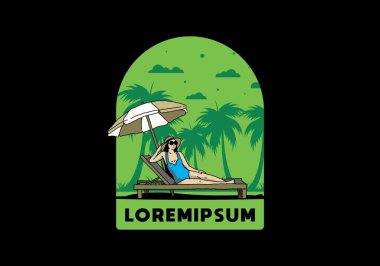 Şemsiye tasarımı altındaki plaj sandalyesinde rahatla.