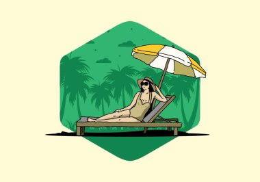 Şemsiye tasarımı altındaki plaj sandalyesinde rahatla.