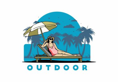 Şemsiye tasarımı altındaki plaj sandalyesinde rahatla.