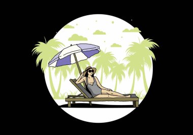 Şemsiye tasarımı altındaki plaj sandalyesinde rahatla.