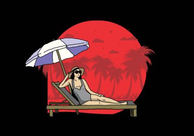 Şemsiye tasarımı altındaki plaj sandalyesinde rahatla.