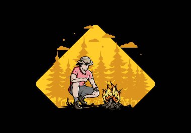 Bir adamın tasarımı şenlik ateşini yakıyor.