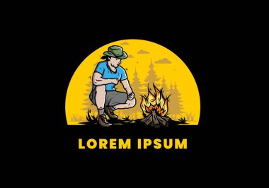 Bir adamın tasarımı şenlik ateşini yakıyor.