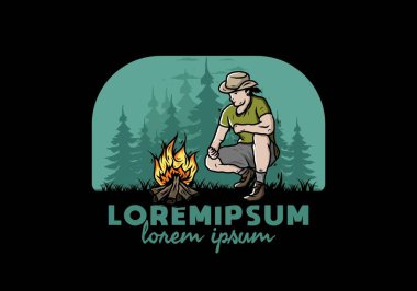 Bir adamın tasarımı şenlik ateşini yakıyor.