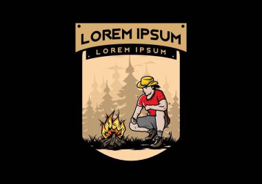 Bir adamın tasarımı şenlik ateşini yakıyor.