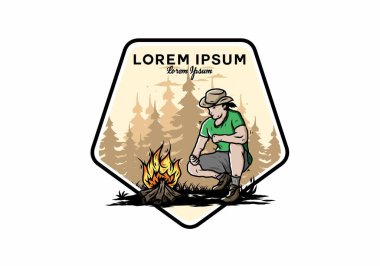 Bir adamın tasarımı şenlik ateşini yakıyor.