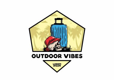 Seyahat eden bir valizin altına şapka takan bir kafatası tasarımı.