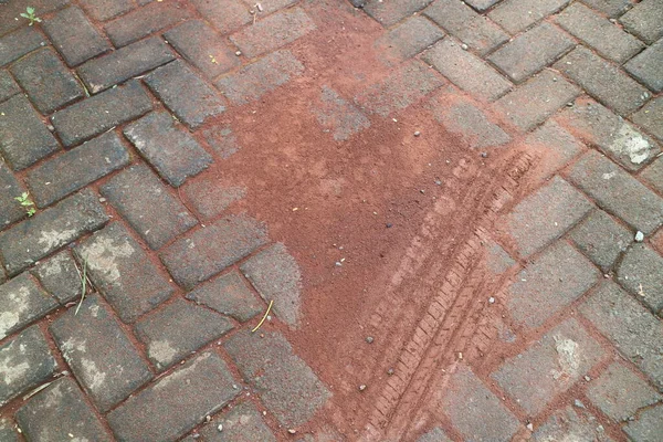 Uma Foto Uma Pavimentação Ruas Cheias Barro Vermelho — Fotografia de Stock