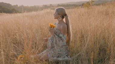 4k slow motion portrait of beautiful happy pregnant woman in countryside during sunset