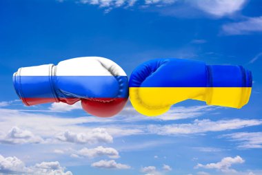 3D illustration flags of Russia and Ukraine on blue cloudy sky background.