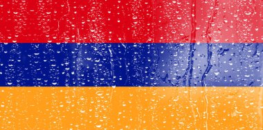 3 Boyutlu Ermenistan Bayrağı su damlası arkaplanlı bir bardakta.