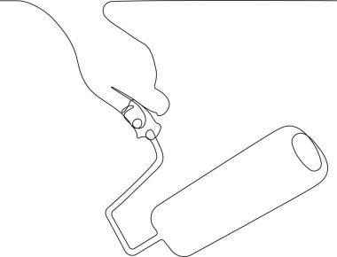 İnsan eli kirli boya silindirini tutuyor.