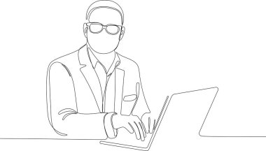 Gözlüklü adam dizüstü bilgisayarda ya da defterde oturuyor.