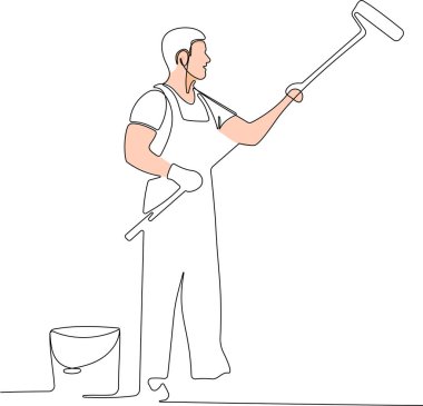 Duvarı silindir kullanarak boyayan eldiven giyen bir ressam.