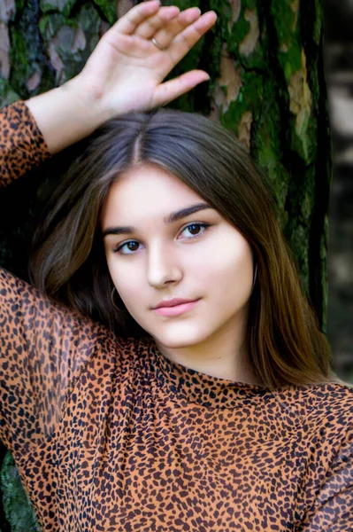 Emotional Girl Teenager Long Hair Hairstyle Braids Green Shirt Sits — Stockfoto