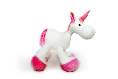 Lovely white pony doll isolated on white background. Adorable teddy bear for decorative. High quality photo