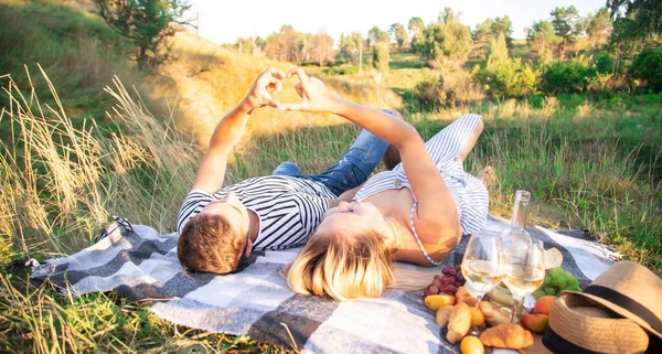 couple in love on a picnic in the park. Nature. Selective focus