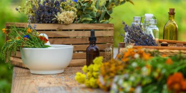 Medicinal herbs and natural tinctures. Selective focus. Nature.