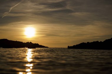 Menorca 'da turuncu gün batımı.