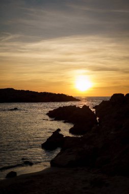 Menorca 'da turuncu gün batımı.